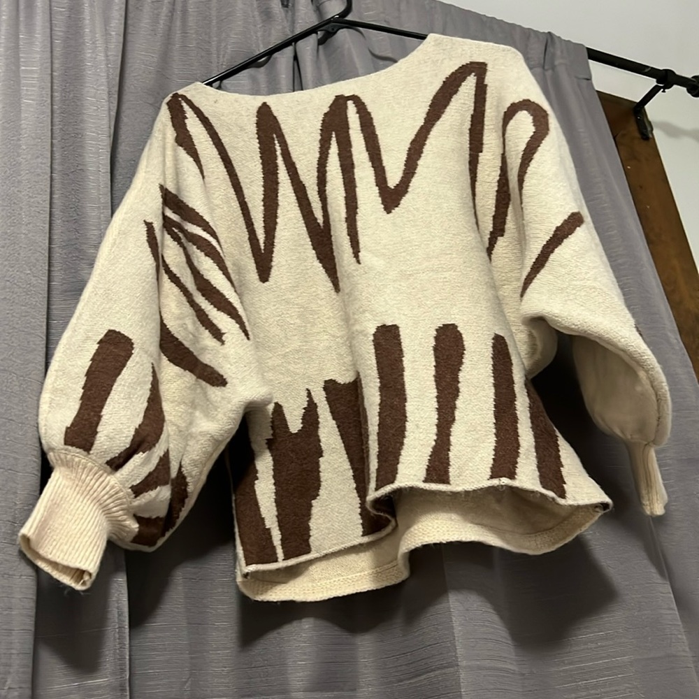 Cute very warm sweater. Good for work, in an office setting.
